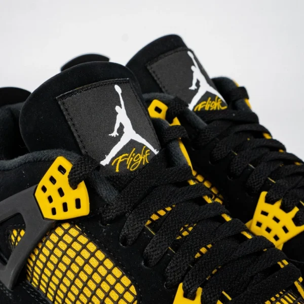 sepatu-jordan-4-retro-black-thunder-yellow-sneakers-authentic